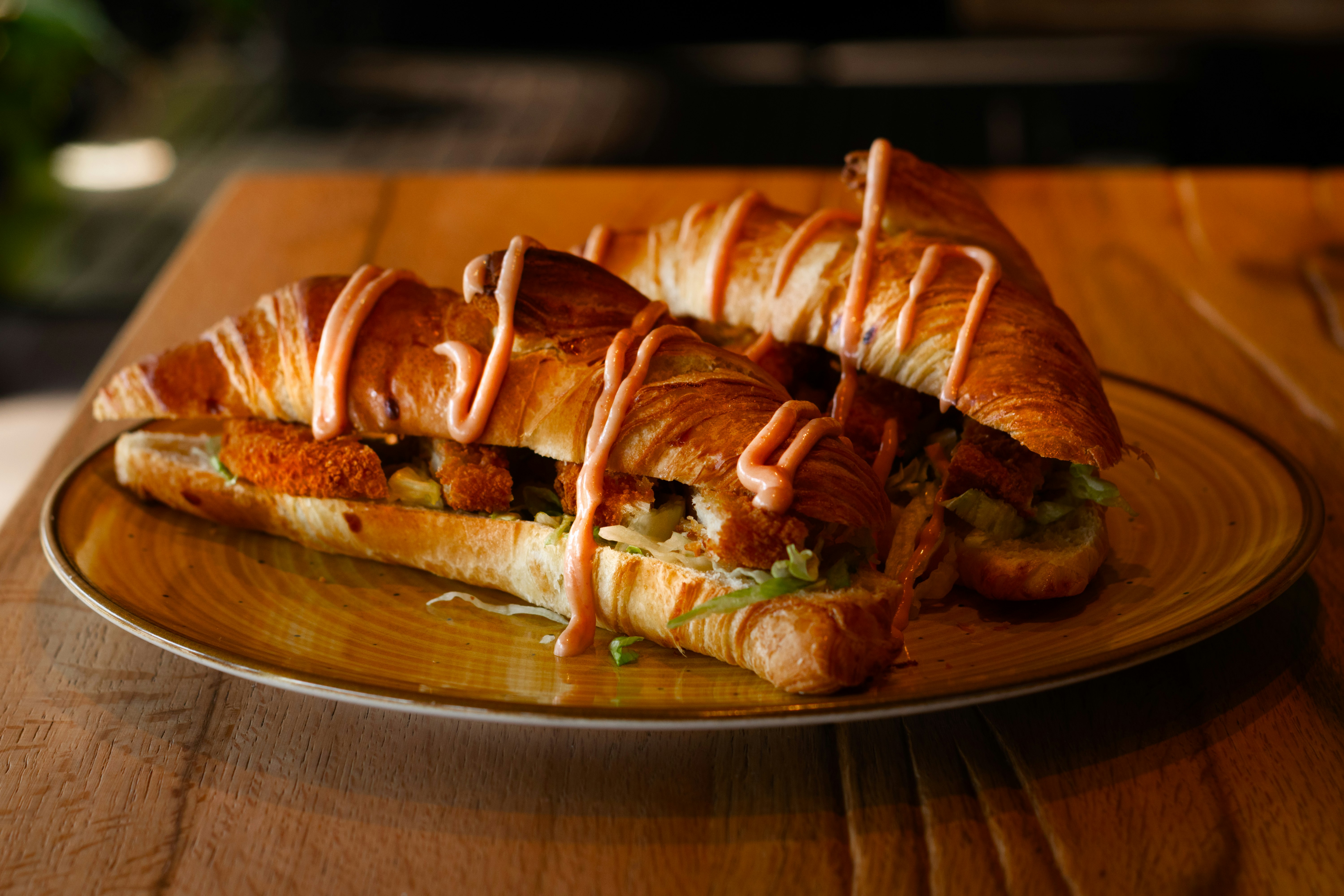 bread on brown wooden round plate